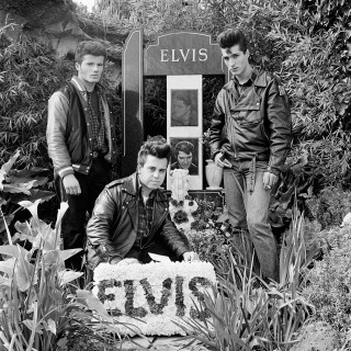 Three young men with floral tribute on the 14th anniversary of Elvis' death Elvis Memorial Melbourne 1991