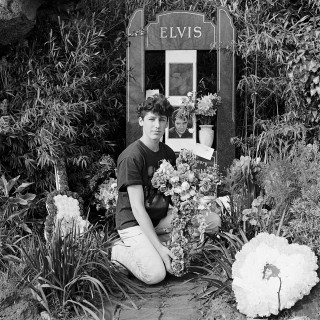 Young male Elvis fan with floral wreath on the 16th anniversary of Elvis' death Elvis Memorial Melbourne 1993